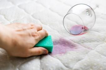 Removing wine stains from bed mattress