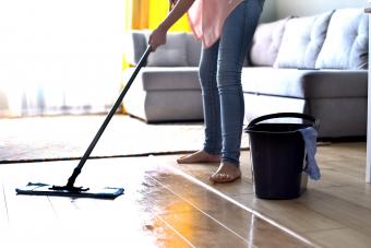 Woman mopping floor