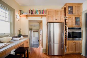 Back Door in Kitchen With Built-In Wood Cabinets