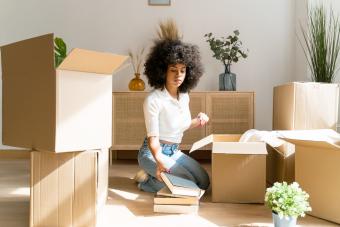 Woman unpacking in her new apartment