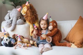 Child with stuffed giraffe