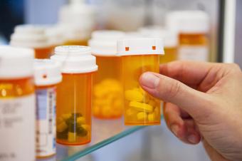 Clever pill bottle storage solution using a bread box