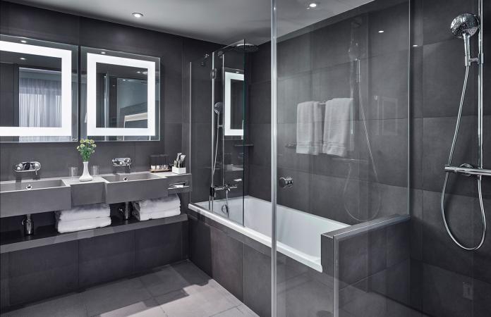 Modern bathroom showing sink and shower