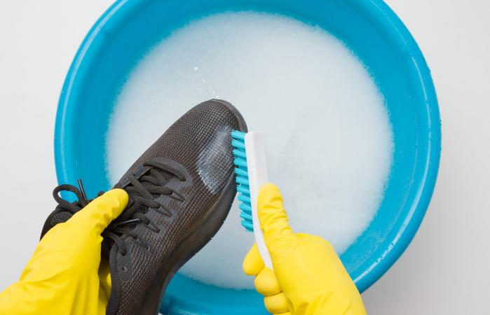 Disinfecting black sneakers