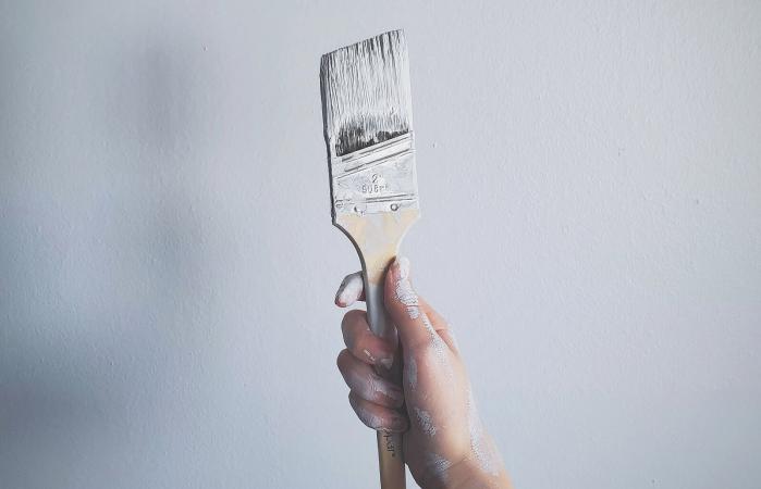 Woman Holding Paintbrush