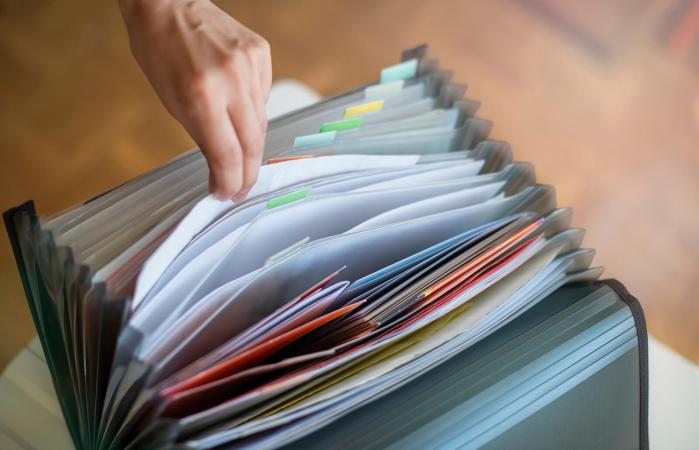 woman looking in folders