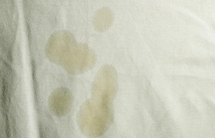 Oil stain on white cloth