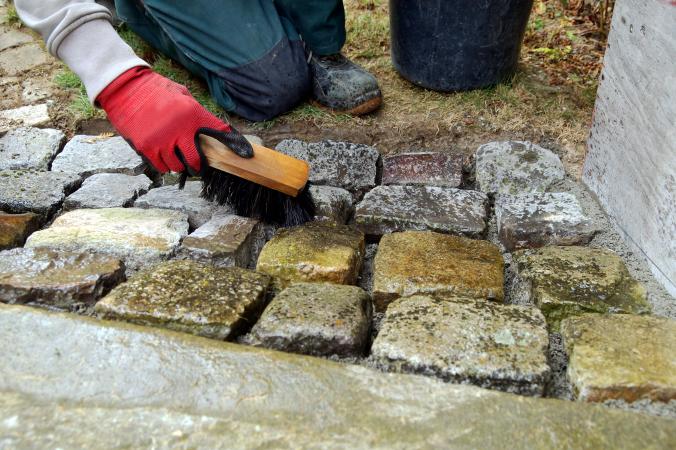 cleaning brick with stiff bristle brush