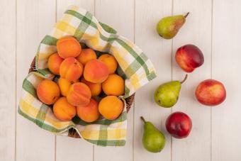 Fruits in basket on table