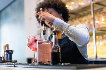 Bartender stirring cocktail