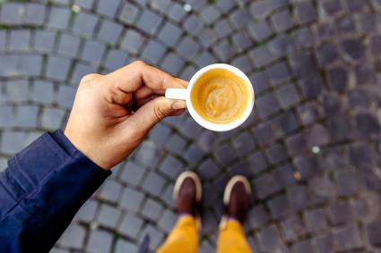 Drinking espresso with grappa