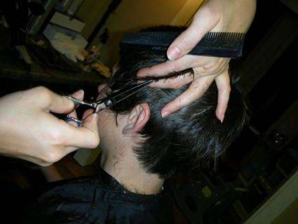 Giving a haircut.