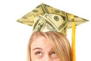 student with money mortarboard