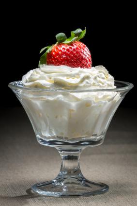 whipped cream with strawberry on top