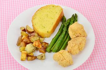 Catfish nuggets meal on white plate