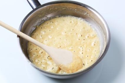 stirring white sauce