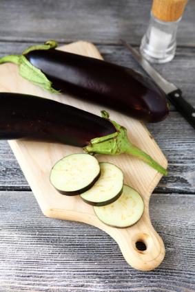 Eggplants on a cutting board; © Olha Afanasieva | Dreamstime.com