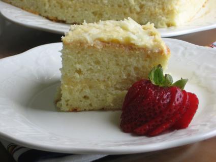 Image of a piece of yema cake with strawberry slices