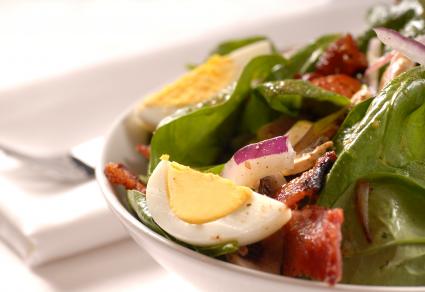 Wilted spinach salad with hot bacon dressing