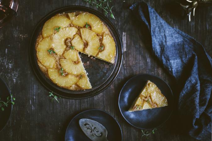 Pineapple upsidedown cake on wooden table