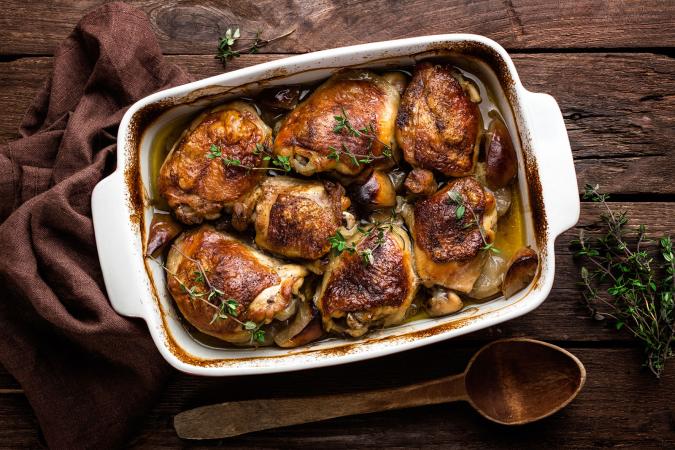 Dish of baked chicken thighs