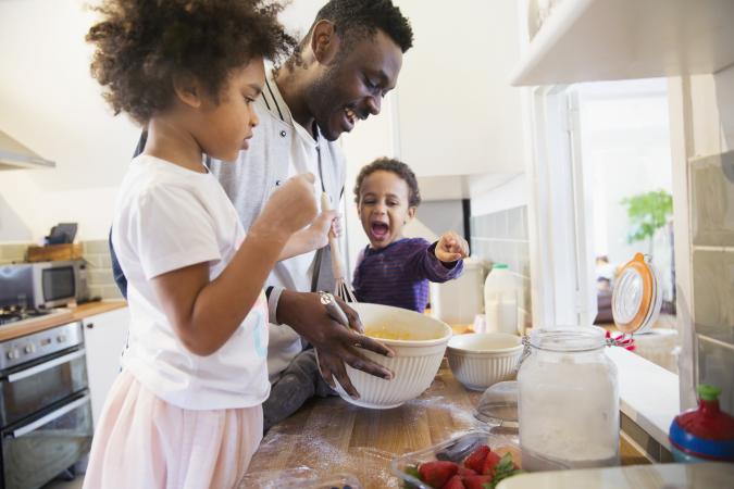 Father cooking with children