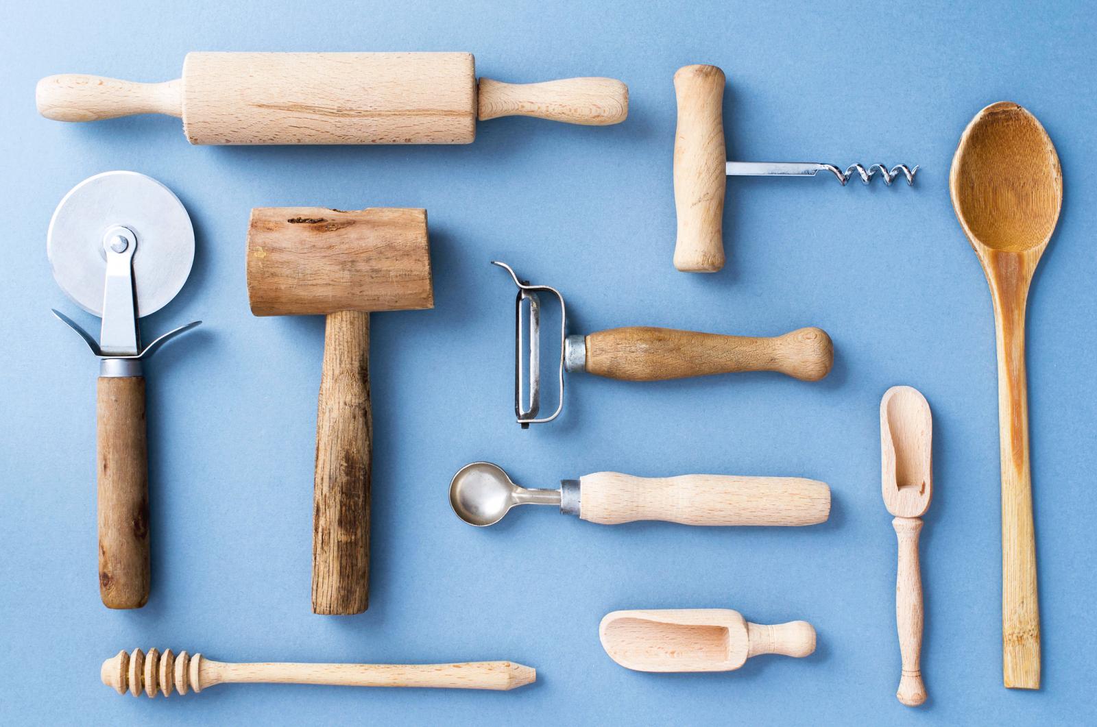 Wooden Kitchen Utensils On Blue Background