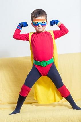 Boy in superhero costume