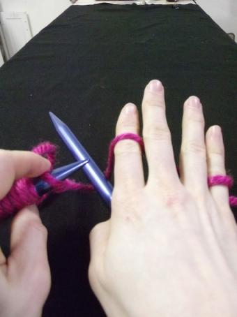 Step two of how to hold the yarn for knitting