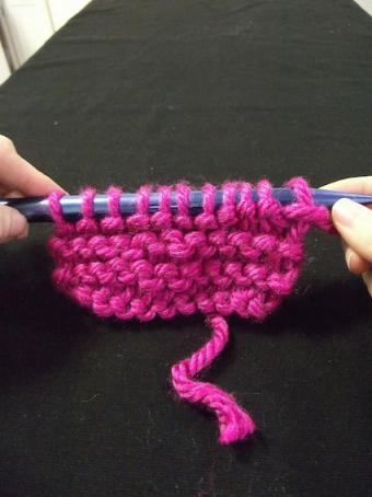 Garter stitch knitted fabric, still on the needles