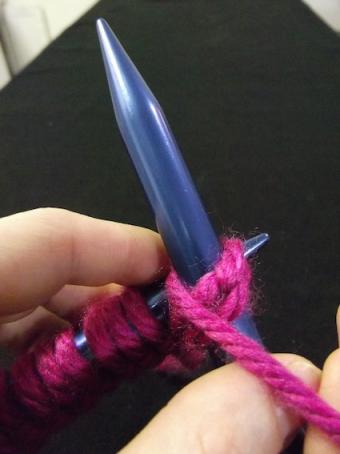 Step three of purling for knitting