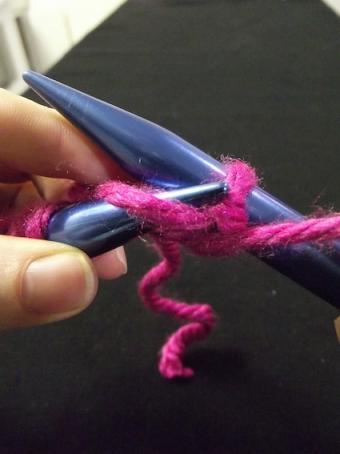 Step five of purling for knitting