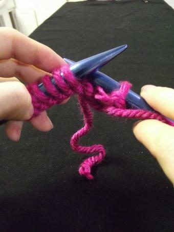 Step six of purling for knitting