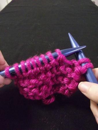 Step one of binding off for knitting