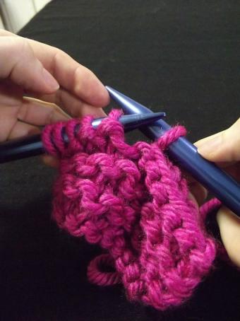 Step four of binding off for knitting