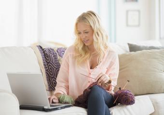 young woman learning knitting