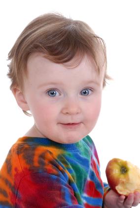 Baby wearing tie-dyed shirt