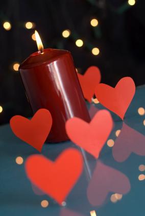 Valentine candle with paper hearts