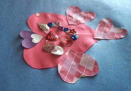 Paper fish made from heart shapes.