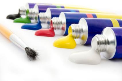 Brush and tubes of paint