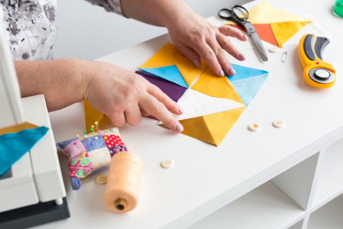 putting together pattern of colored fabric