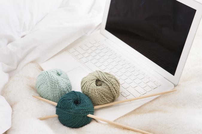 Knitting items and laptop