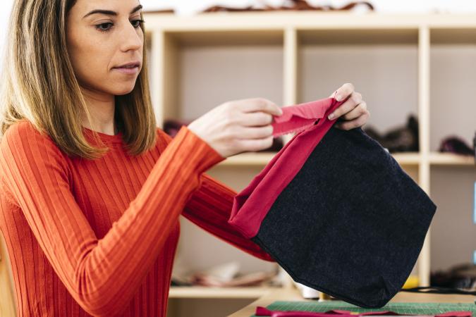 Woman holding textiles