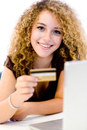 Young woman using a credit card