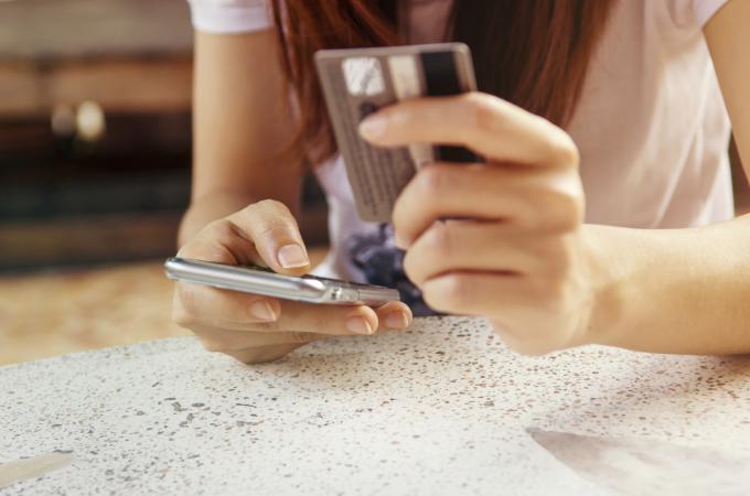 Credit card in hand