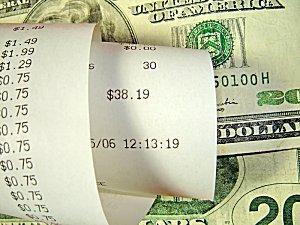 Rolled receipt and cash.