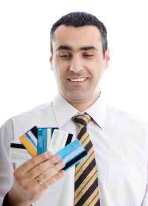 Man Holding Credit Cards