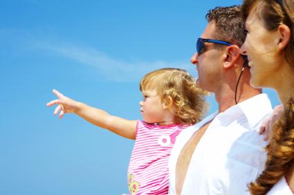 family with blue sky