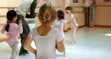 Young ballerinas getting instruction