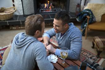 happy couple playing card game